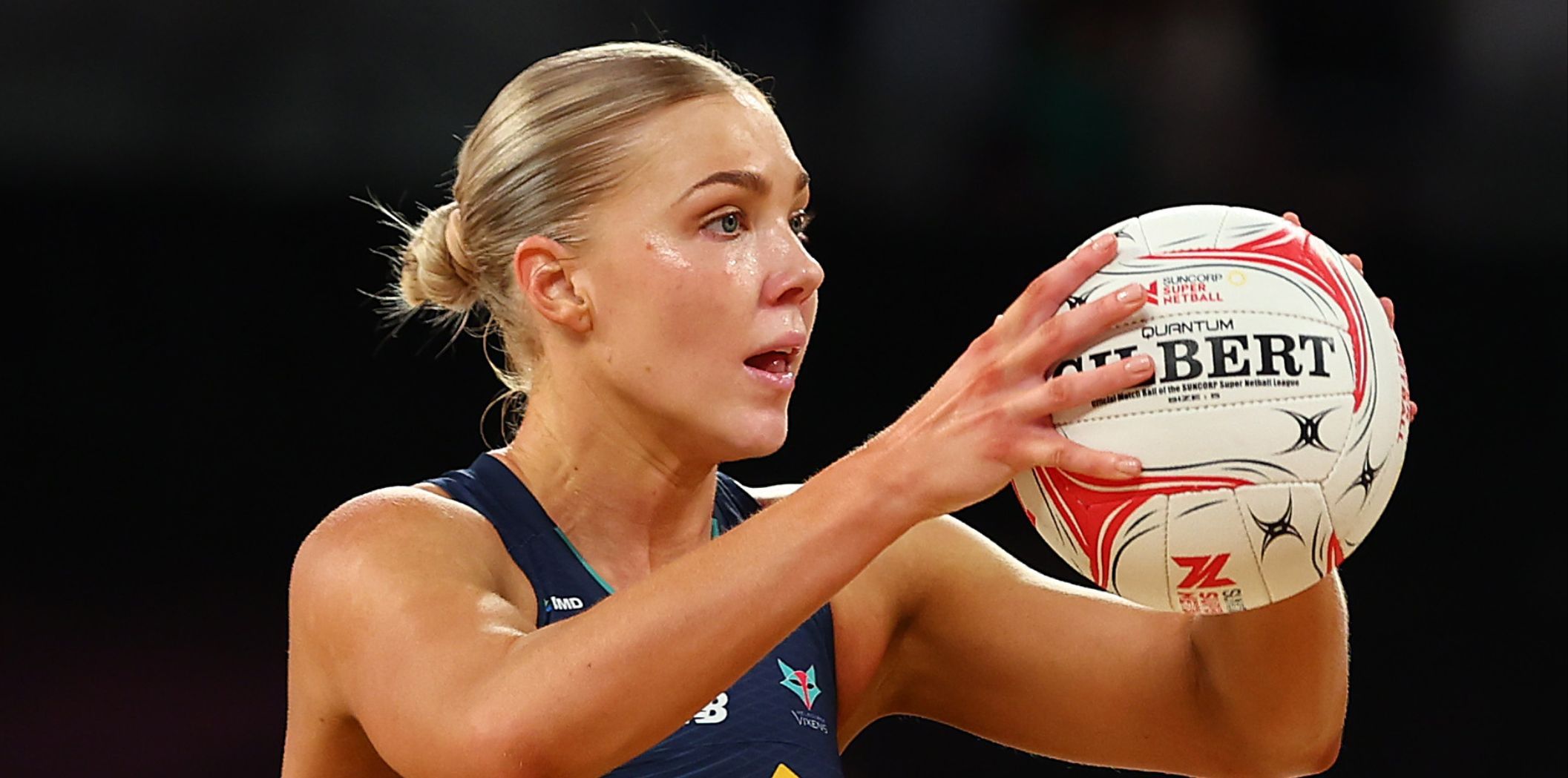 Kate Moloney passes a ball